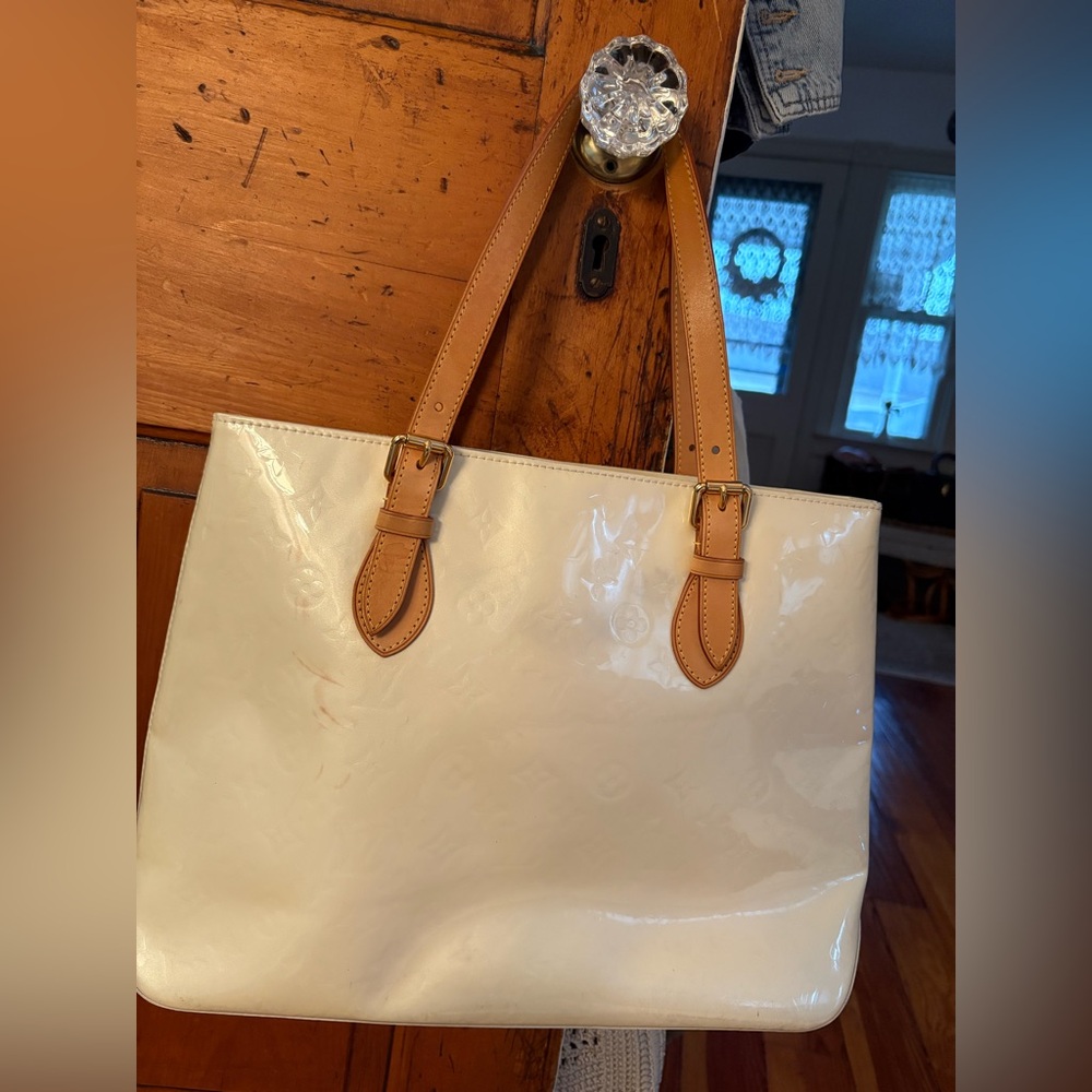 Louis Vuitton Authenticity Certificate with Blue and Black Accents